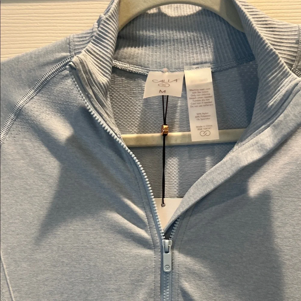 CALIA by Carrie Underwood Light Blue Golf Pullover - Picture 11 of 11